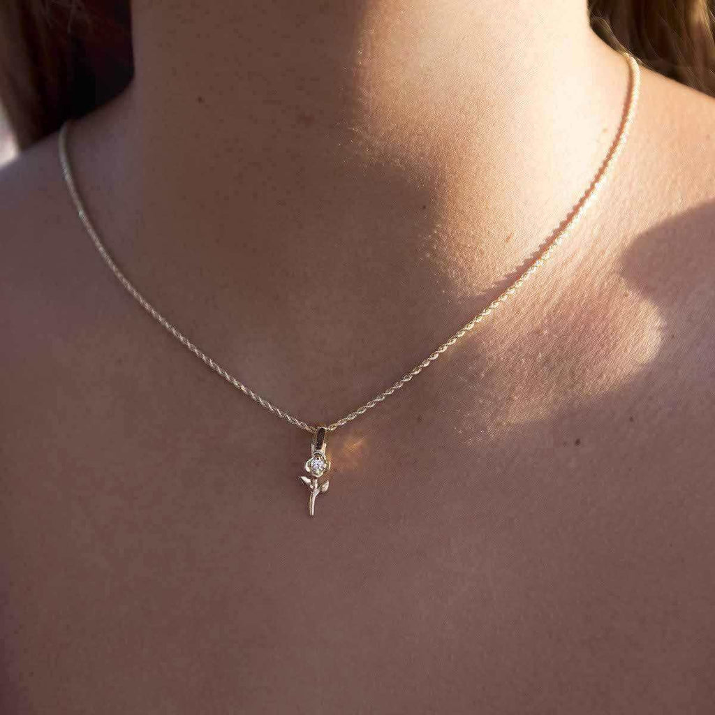 Solid Gold Micro Flower Pendant-VS Diamonds