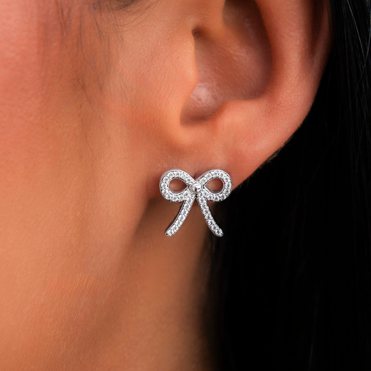 Diamond Bow Stud Earrings in White Gold