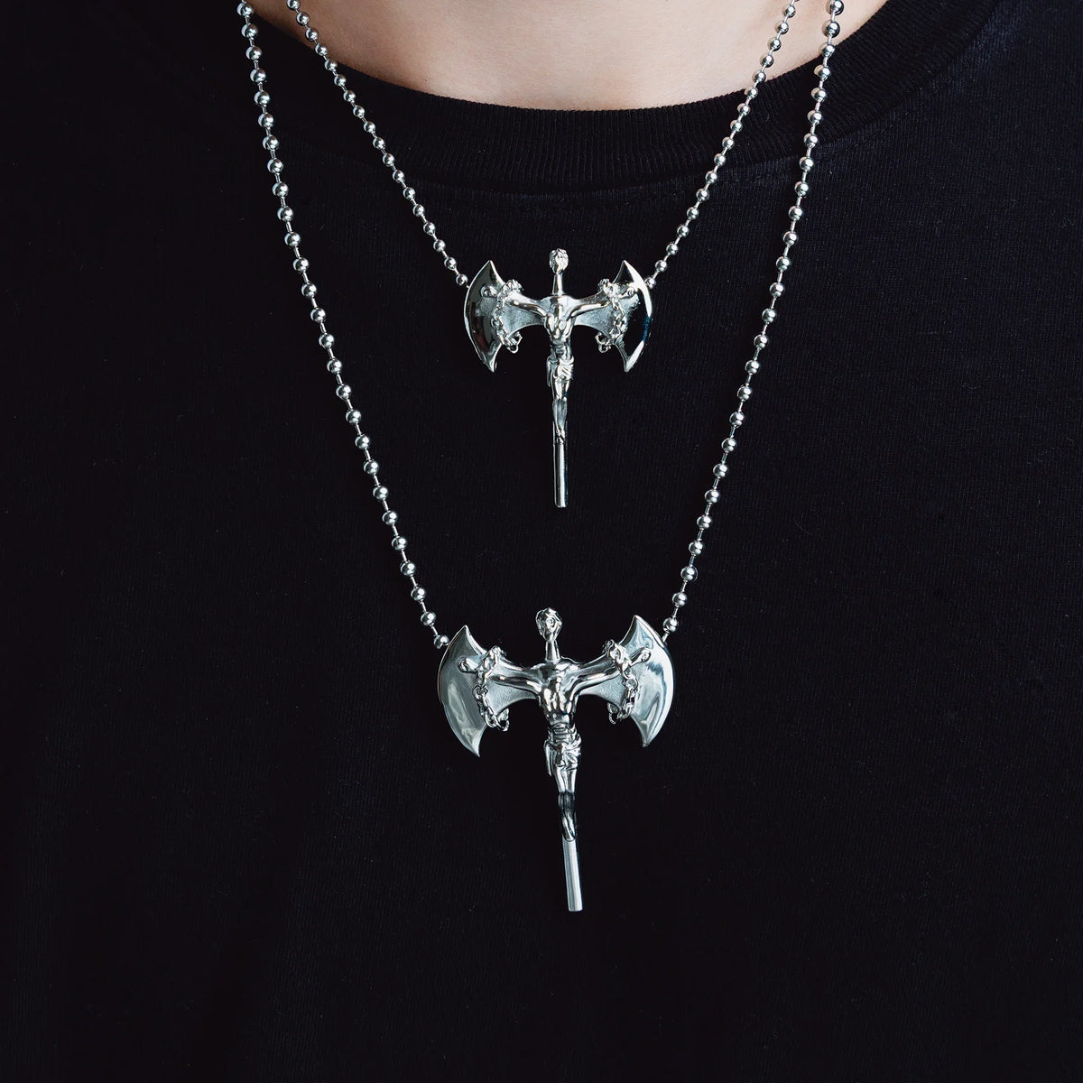 RELIGION IS WAR PENDANT