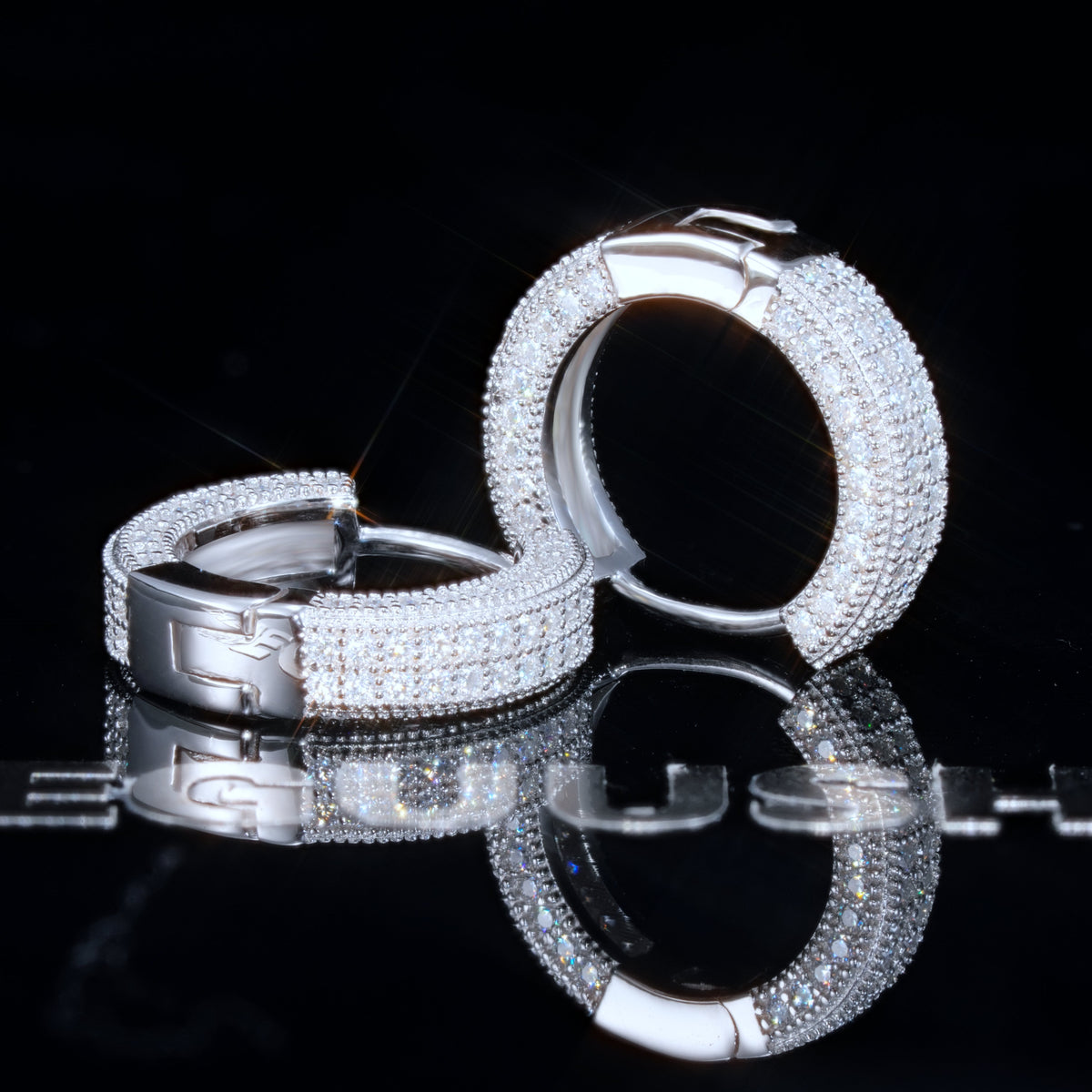 925s VVS1 Moissanite Fully Iced 3D Hoop Earrings In White Gold